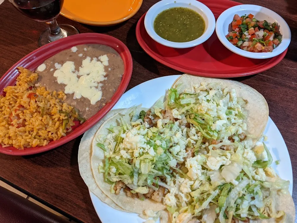 Shrimp Tacos Pico De Gallo Spanish Rice and Refried Beans